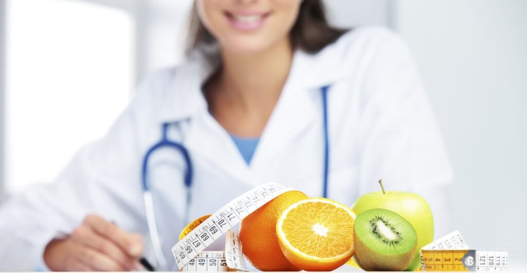 A healthcare professional discusses medical weight loss options with fruits and a measuring tape, highlighting wellness.